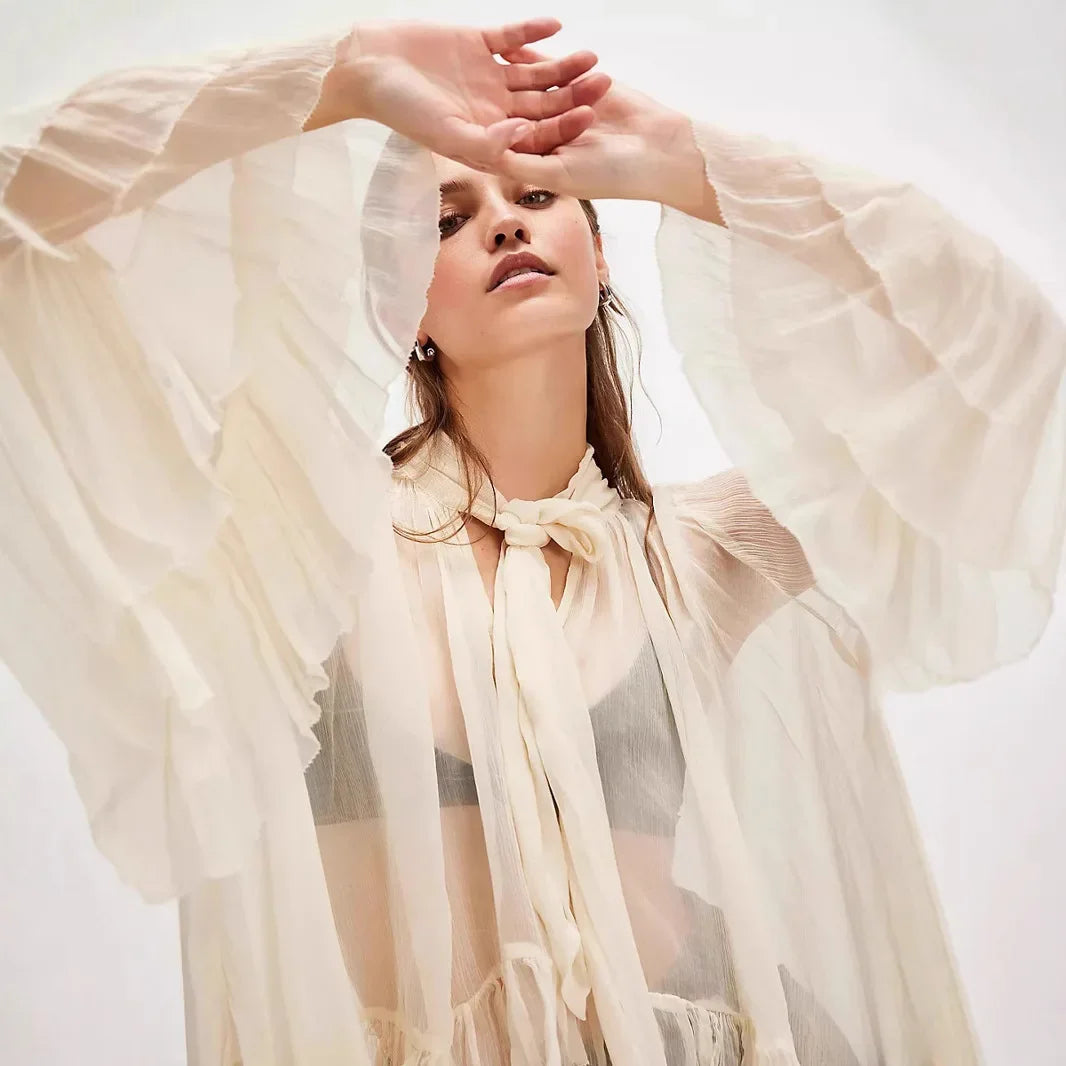 Moda sexy transparente camisa feminina primavera verão novo design de manga sino nó francês chique translúcido topo com botões