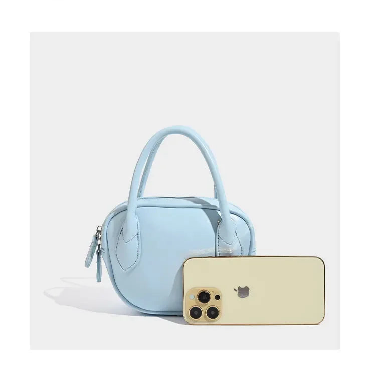 Bolsa de mão versátil Capri